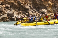 men rowing a boat