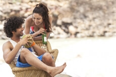 couple chatting on the beach