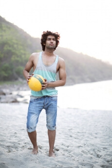 man holding a volley ball
