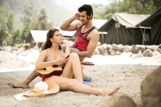 young couple spending time together on a beach