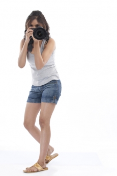 young girl taking shot from the front 