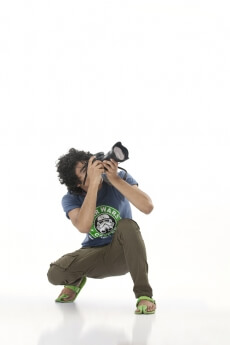 boy using a DSLR