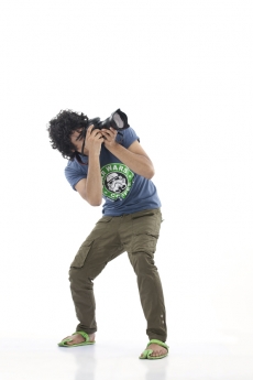 boy taking a photograph