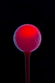 golf ball on a flagstick