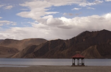 view of the red sala at the pangong lake
