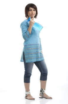 housewife in a blue kurta holding house cleaning product