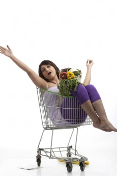 lady yawning on a shopping cart