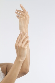close-up of a young woman showing her arms