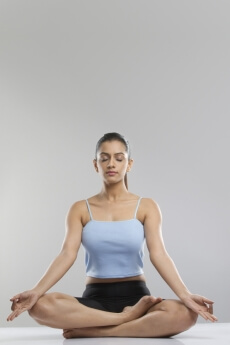beautiful woman practising meditation