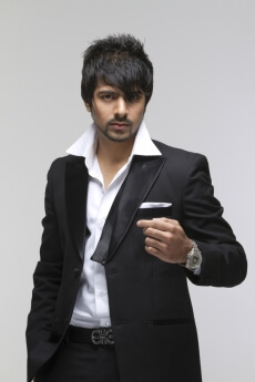 man in black suit posing in style 