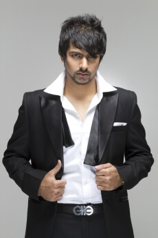 fashionable male model in a black suit