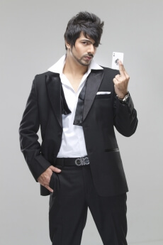 man posing with an ace of card