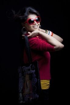 girl in stylish clothing with a trendy handbag