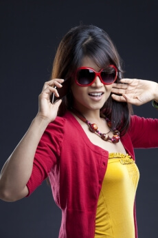 attractive young female with a mobile phone