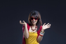 attractive girl in trendy outfit posing in excitement