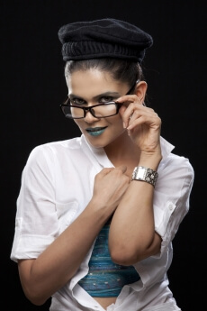 girl giving a sensual look at the camera with spectacles