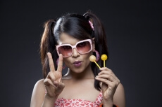 girl posing with candies 