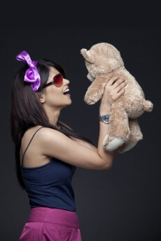 woman lifting her stuff toy