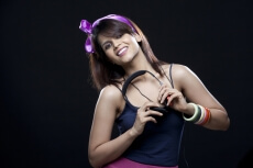 young teenager holding earphones