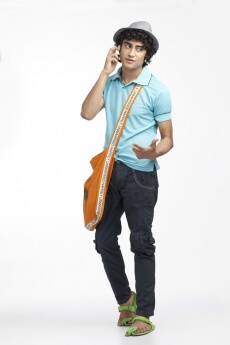 portrait of a boy talking on the phone