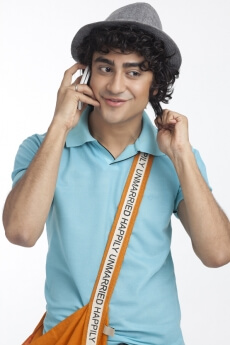 portrait of a boy talking on the phone
