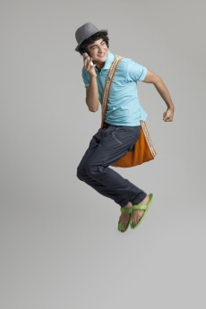 college student jumping in excitement