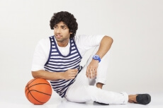 college boy posing with basketball