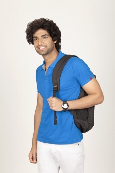 college boy carrying backpack