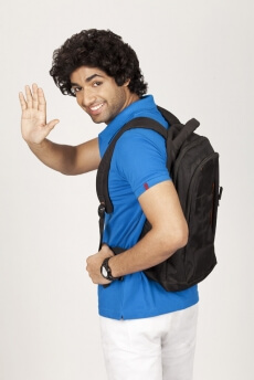 college boy waving hand while smiling