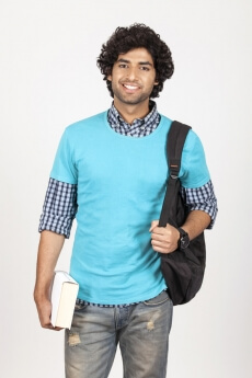 college carrying backpack with book in hand 