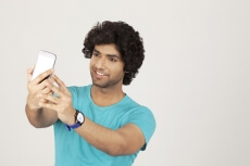 youngster taking selfie 