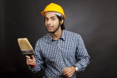 man ready to paint wall