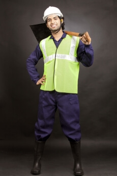 man posing with shovel