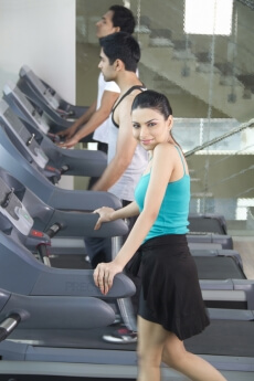 attractive woman posing while exercising