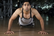 guy doing stressful push ups