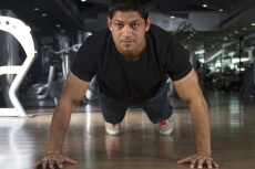 man concentrating on his workout