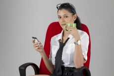 girl sitting on chair and having coffee