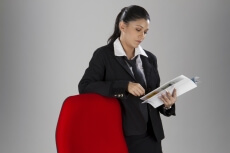 business woman reading a documented file
