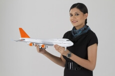 woman with an airplane toy
