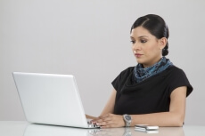 woman working on a laptop 