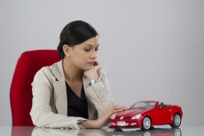 business woman sitting in office with serious expressions