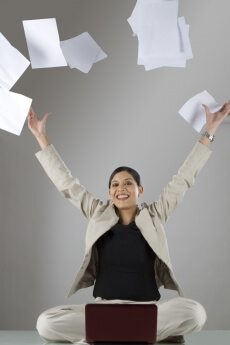 woman throwing papers