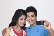 close up of couple taking their picture 