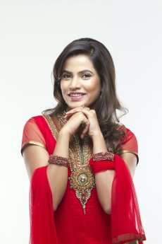 smiling female looking at the camera with simplicity