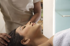 girl taking head massage