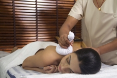 girl having back treatment at spa