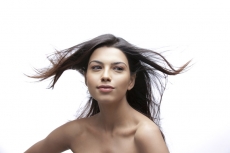 half-length portrait of a pretty girl against white background