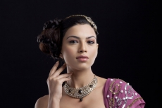 traditionally dressed woman looking into the camera