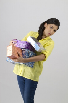 girl carrying gifts