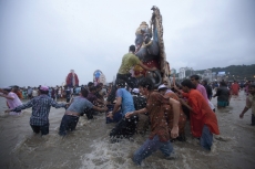 indian celebrating ganesh visarjan 